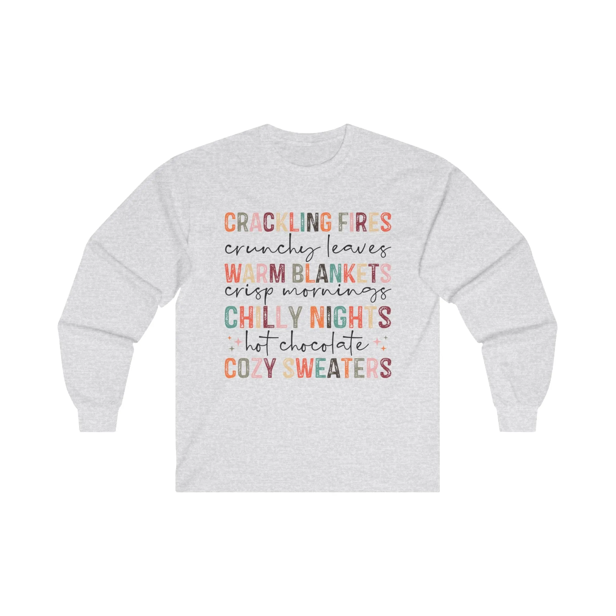 Crackling Fires, Warm Blankets, Chilly Nights, and Cozy Sweaters in this Cozy Long-Sleeve Tee!
