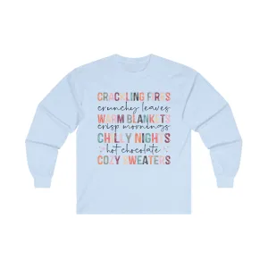 Crackling Fires, Warm Blankets, Chilly Nights, and Cozy Sweaters in this Cozy Long-Sleeve Tee!
