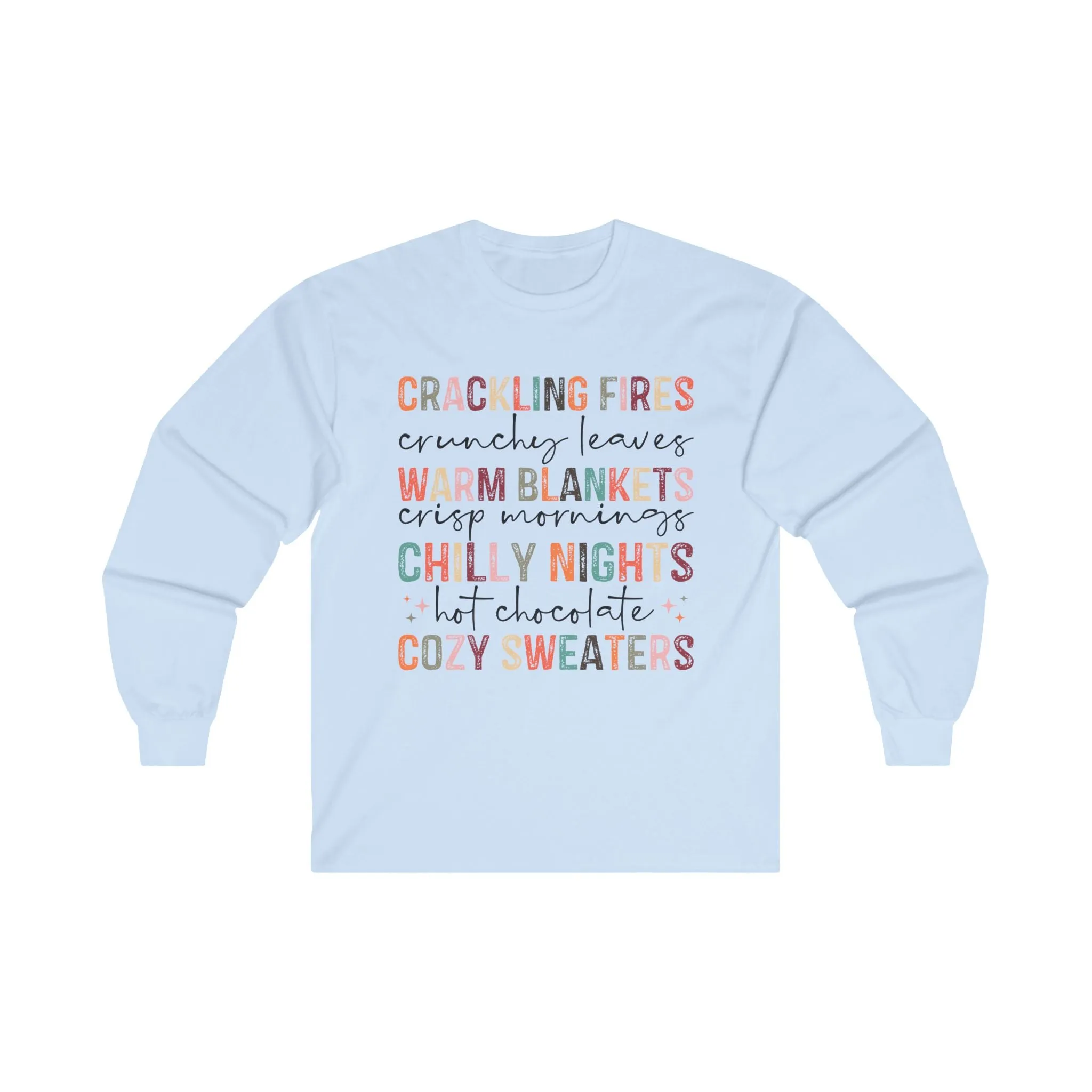 Crackling Fires, Warm Blankets, Chilly Nights, and Cozy Sweaters in this Cozy Long-Sleeve Tee!